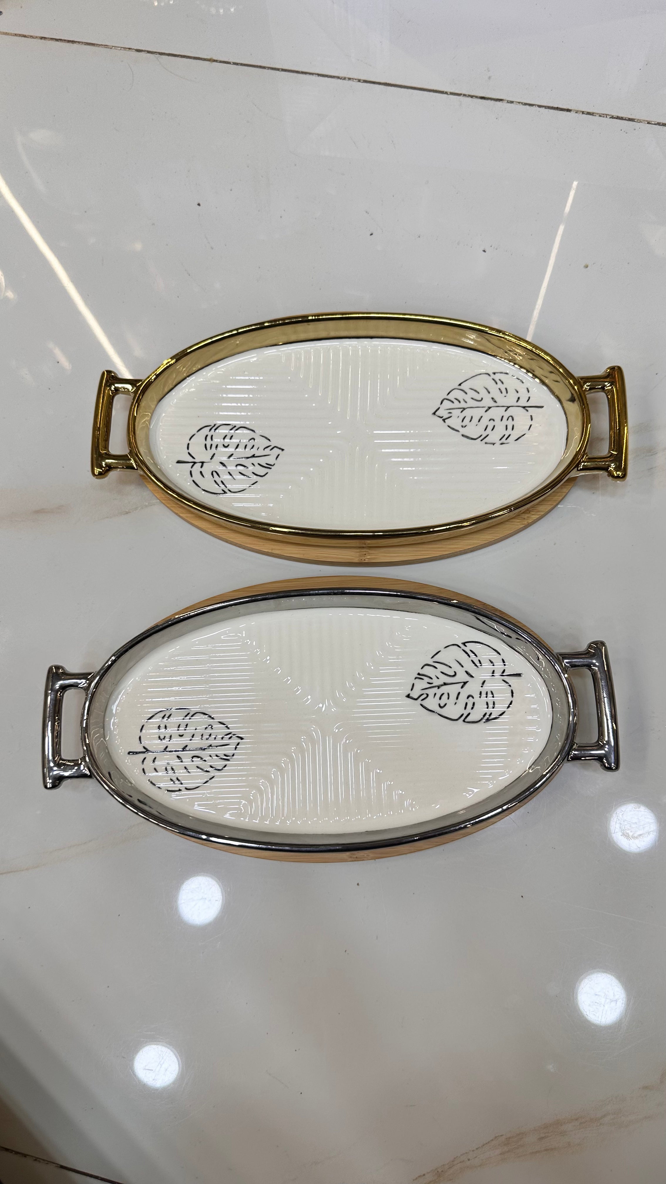 Elegant Oval Ceramic Serving Platter with Monstera Leaf Detail & Wooden Base (Silver Variant)