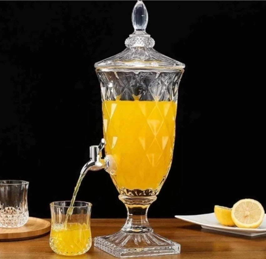 Clear glass juice dispenser