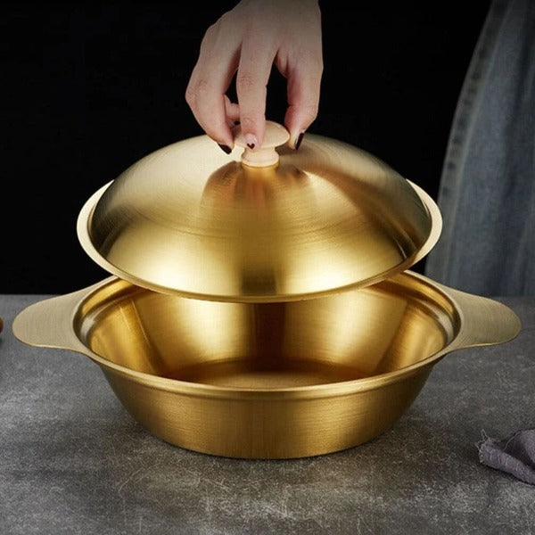 Golden cooking wok with wooden knob