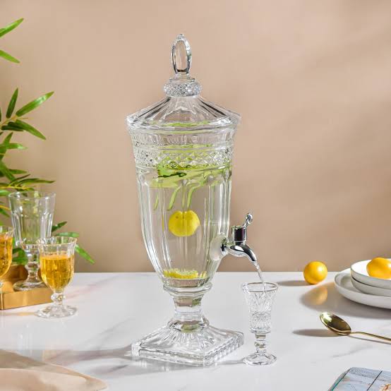 Clear glass juice dispenser