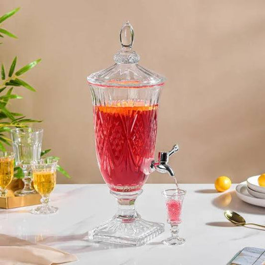 Clear glass juice dispenser