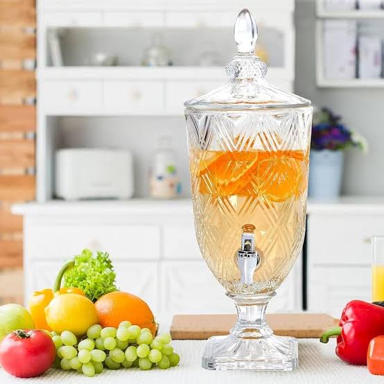 Clear glass juice dispenser